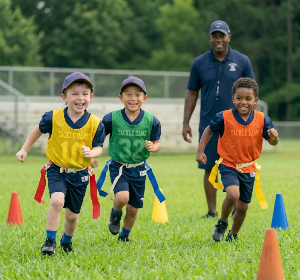 kids playing flag football game ages 6-8 fun practice